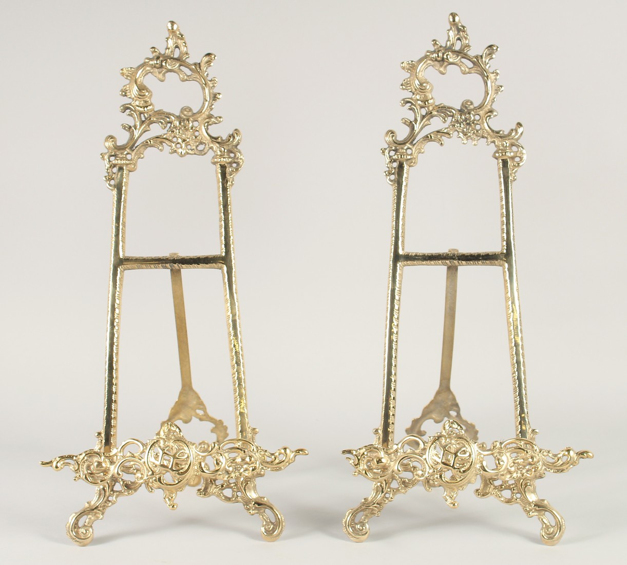 A PAIR OF BRASS PICTURE EASELS. 1ft 9ins.