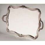 A GOOD SILVER PLATED SQUARE TWO HANDLED TEA TRAY. 24ins long.