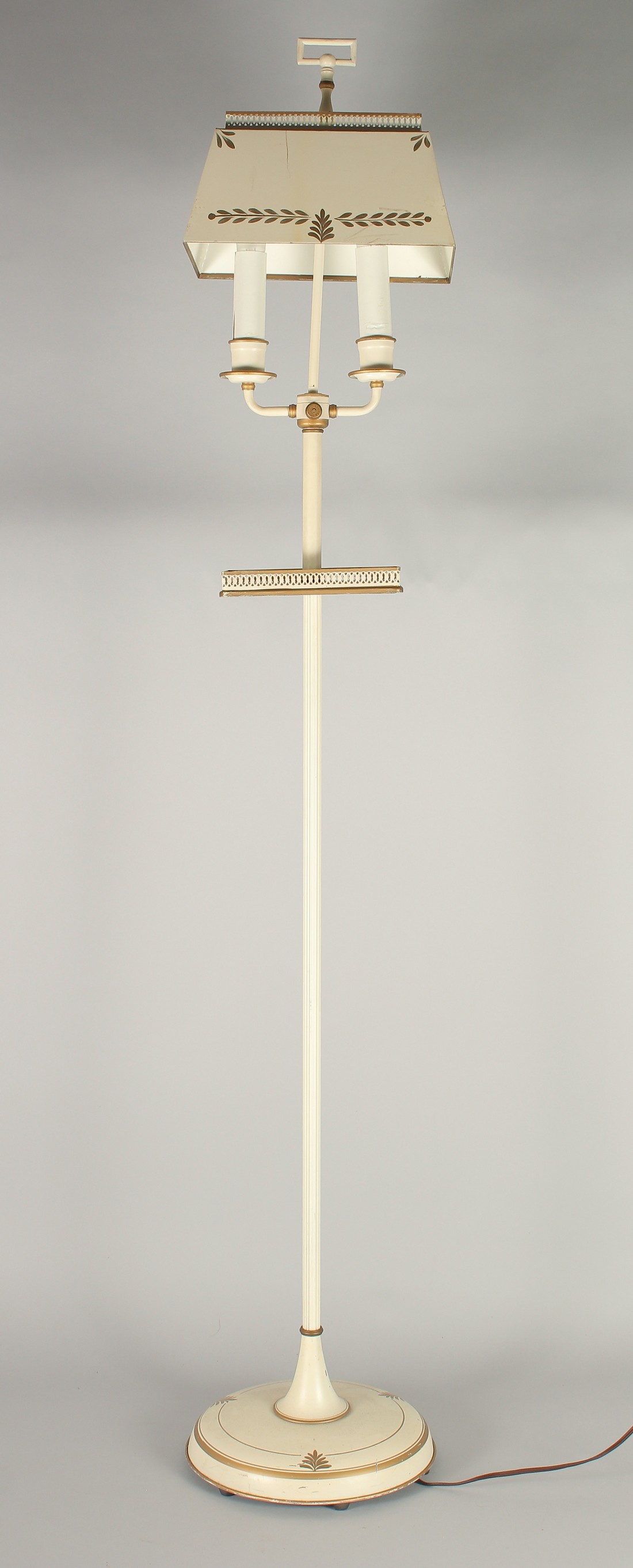 A WHITE TOLEWARE STANDING LAMP. 5ft high.