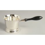 A GEORGE III SILVER BRANDY PAN with turned wood handle. 3.75ins diameter. London 1804. Maker Peter