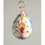 A RUSSIAN SILVER AND ENAMEL EGG PENDANT. 1ins long.