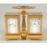 A GILT BRONZE DOUBLE CARRIAGE CLOCK. 4ins high with carrying handle.