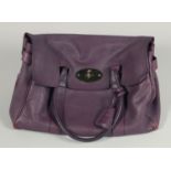 A LARGE MULBERRY MAUVE SOFT LEATHER BAG. 14ins x 10.5ins with two leather handles.