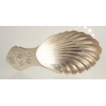 A MODERN SILVER SHELL BOWL CADDY SPOON. Dublin 1999. Maker PWK