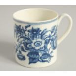 AN 18TH CENTURY WORCESTER COFFEE CAN printed with the three Flowers pattern.
