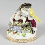 A GOOD MEISSEN PORCELAIN GROUP OF A BOY AND GIRL with garlands of flowers on an oval base. Cross