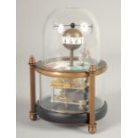 A SMALL FISH GLASS DOMED CLOCK 5.5ins high.