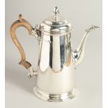 A GOOD VICTORIAN SILVER TAPERING COFFEE POT with wooden handle. London 1893. Weight 20ozs.