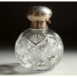 A CUT GLASS SCENT BOTTLE with silver top. Birmingham 1972.