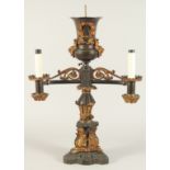 THOMAS MESSENGER. A REGENCY BRONZE AND ORMOLU TWO LIGHT CANDELABRA with outstretched arms and an urn