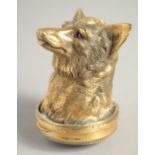 A GOOD RUSSIAN SILVER GILT DOG'S HEAD SNUFF BOX, 2.5ins long with blue enamel and diamond base. Mark