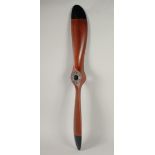 A WOODEN PROPELLER 3ft 2ins long.