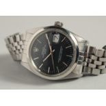 A ROLEX PERPETUAL OYSTER DAY DATE WRISTWATCH with slate grey dial, no. 74, in original box.