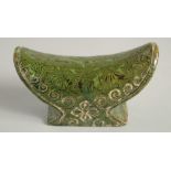 A CHINESE GREEN POTTERY BRUSH POT. 4ins long.