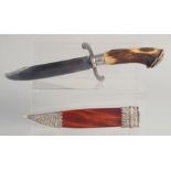 A RARE 19TH CENTURY NORTH INDIAN KUTCH SILVER MOUNTED EUROPEAN STYLE HUNTING DAGGER, with antler