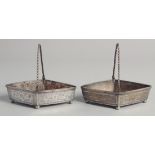 A PAIR OF 19TH CENTURY PERSIAN QAJAR SIGNED SILVER BASKETS, weight 290g, 14cm wide.