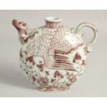 A CHINESE UNDERGLAZE RED PORCELAIN WINE EWER, with handle and spout moulded into the design of a