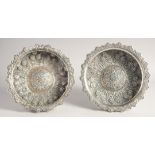 A PAIR OF TURKISH HAMMAN SILVER CIRCULAR BOWLS, each embossed and chased with foliate decoration and