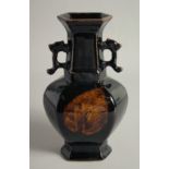 A CHINESE TWIN HANDLE JIAN WARE VASE. 25.5cm high