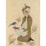 A PERSIAN PAINTING ON PAPER, depicting a kneeling falconer with gilt painted robe, 21cm x 15cm.