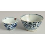 TWO CHINESE BLUE AND WHITE PORCELAIN BOWLS, each with foliate decoration, 12.5cm and 9cm.
