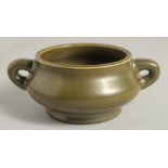 A CHINESE TEA DUST GLAZE TWIN HANDLE CENSER, with impressed mark to base, 13.5cm handle to handle.