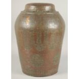 A LARGE 19TH CENTURY PERSIAN QAJAR TINNED COPPER VASE, engraved with decorative roundels of
