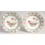 A PAIR OF CHINESE FAMILLE ROSE PORCELAIN DISHES, painted with a central floral motif with various