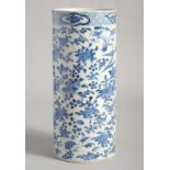A CHINESE BLUE AND WHITE PORCELAIN CYLINDRICAL VASE, painted with birds and flora, the base with