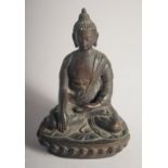 A FINE 18TH/19TH CENTURY INDIAN OR NEPALESE BRONZE BUDDHA, inscribed to the reverse. 10.5cm high