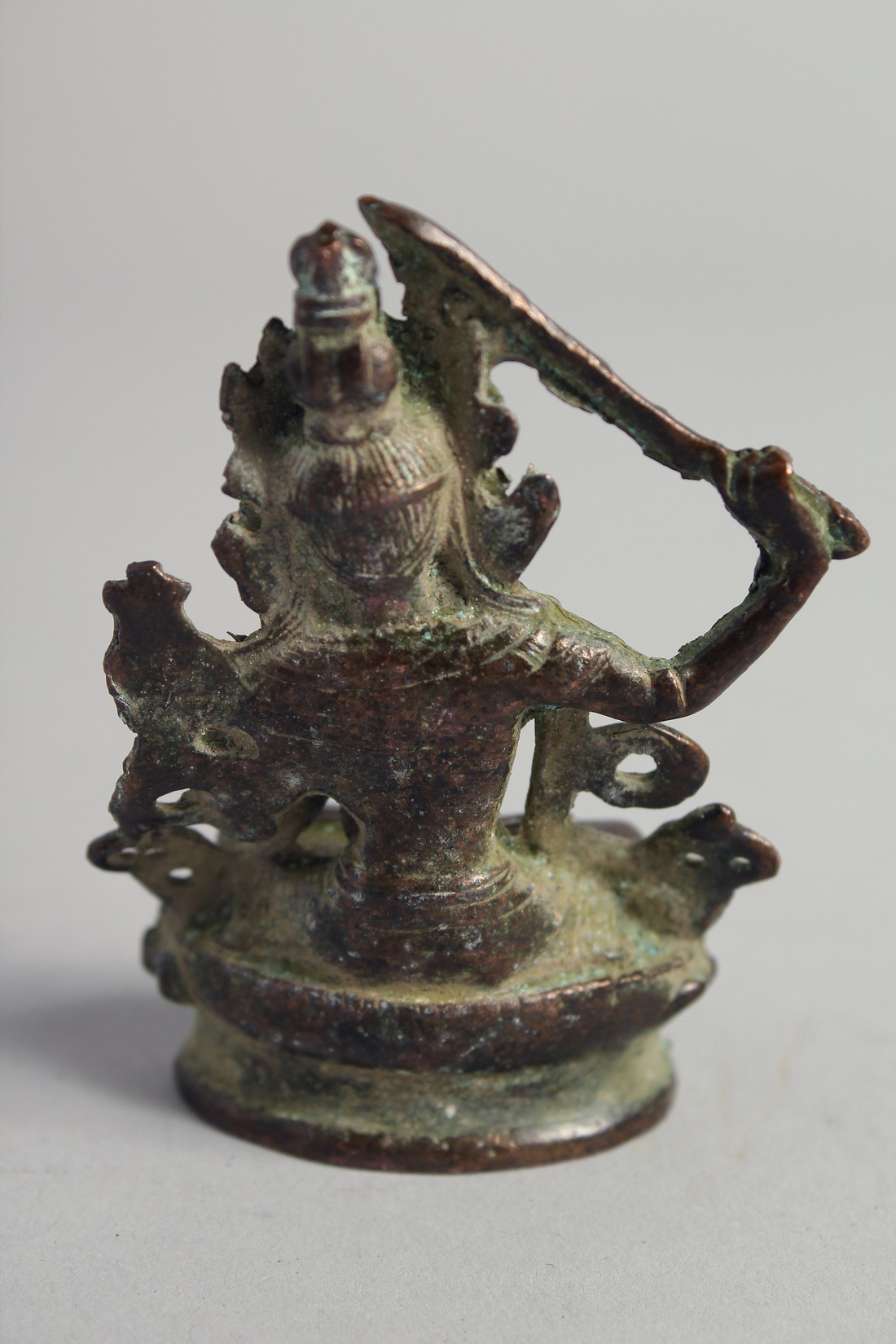A SMALL TIBETAN BRONZE BUDDHA, 7.5cm high. - Image 2 of 3