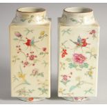 A PAIR OF CHINESE FAMILLE ROSE PORCELAIN SQUARE FORM VASES, painted all over with insects and flora,