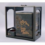 A 19TH CENTURY JAPANESE LACQUER PICNIC BOX with gilt decoration, the box containing four stacking