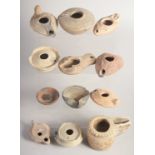 A FINE COLLECTION OF TWELVE CLAY AND TERRACOTTA OIL LAMPS, from tenth to nineteenth century,