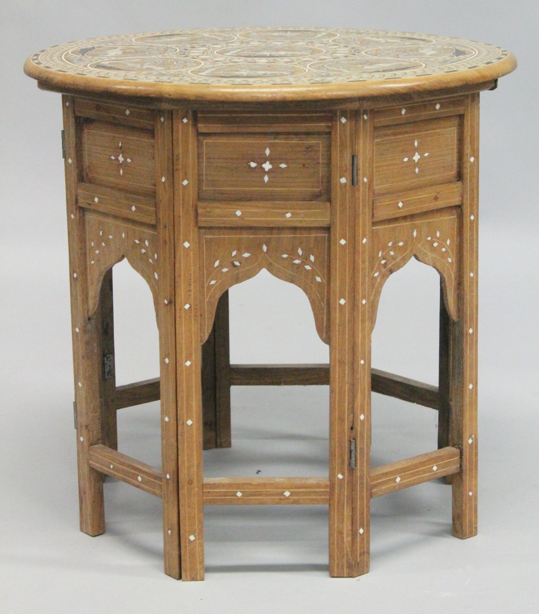A GOOD AND UNUSUAL INDIAN BONE INLAID CIRCULAR HARDWOOD TABLE, with folding base, the top inlaid - Image 4 of 4
