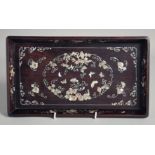 A FINE CHINESE MOTHER OF PEARL INLAID FOOTED RECTANGULAR TRAY, with a central oval of foliate