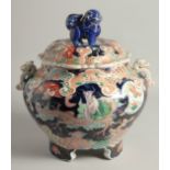 A VERY LARGE JAPANESE IMARI TWIN HANDLE KORO AND COVER, painted with a dragon as well as various