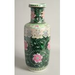 A LARGE CHINESE FAMILLE NOIR PORCELAIN VASE, painted with large flower heads and scrolling vine,