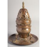 AN 18TH CENTURY TURKISH OTTOMAN GILT COPPER TOMBAK INCENSE BURNER, on circular stand, with hinged