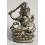 A SMALL TIBETAN BRONZE BUDDHA, 7.5cm high.