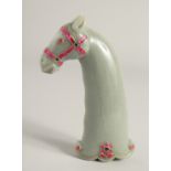 A MUGHAL STYLE CARVED JADE HORSE FORM DAGGER HANDLE, onlaid with decorative wire work and semi-