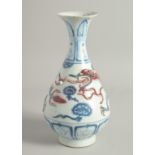 A CHINESE BLUE, WHITE, AND UNDERGLAZE RED PORCELAIN YUHUCHUNPING VASE, with relief decoration