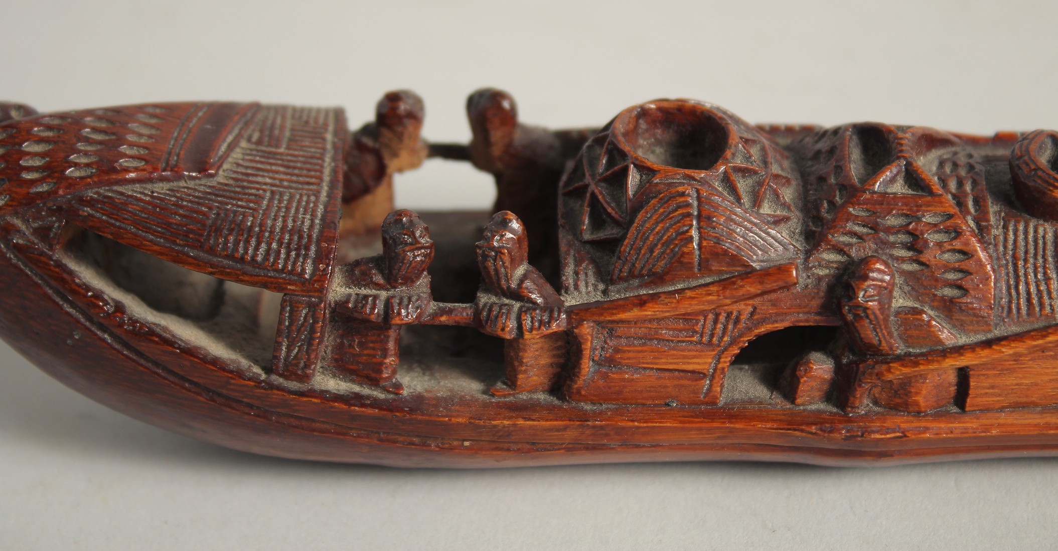 A CHINESE CARVED WOOD MODEL OF A BOAT, 22cm long. - Image 3 of 4