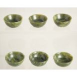 SIX SMALL CHINESE SPINACH JADE CUPS, each 4.5cm diameter, (6).