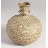 A FINE INDIAN BRASS BULBOUS HUQQA BASE, with floral motif decoration. 15cm high