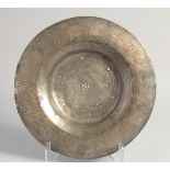 A RARE 10TH CENTURY PERSIAN GHAZNAVID SILVER AND COPPER INLAID HIGH TIN BRONZE DISH, 32cm diameter.