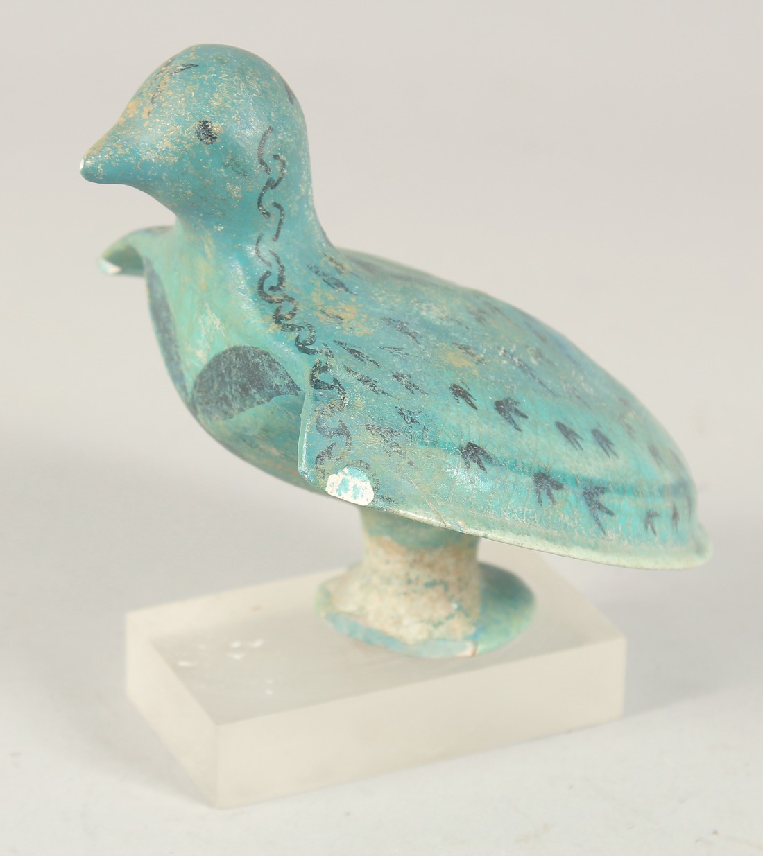 AN EARLY KASHAN TURQUOISE GLAZED POTTERY BIRD ON MOUNT, 14cm long. - Image 2 of 3