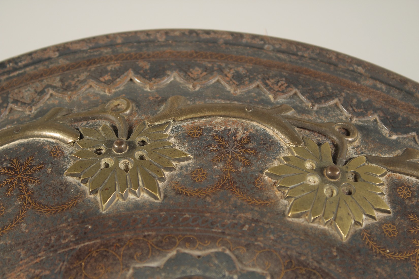 A PERSIAN QAJAR STEEL SHIELD, with gold vine and foliate decoration, the centre with four raised - Image 4 of 5