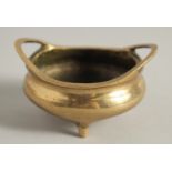 A CHINESE MINIATURE BRASS CENSER, the base with six-character mark, 7cm handle to handle.