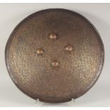 A 19TH CENTURY INDIAN RAJHASTAN GOLD-KOFTGARI STEEL SHIELD (DAHL), mounted with four steel bosses,